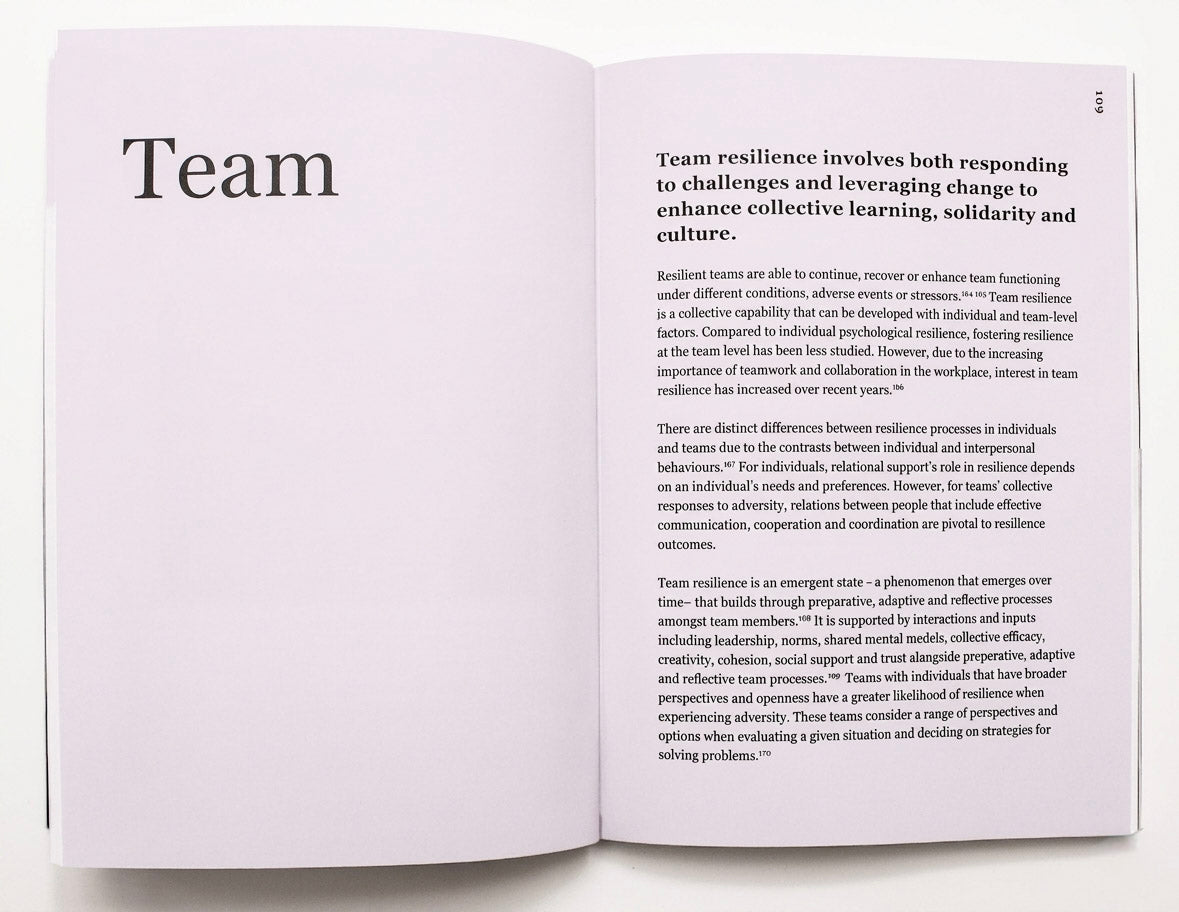 Open book with text on team resilience on a white background